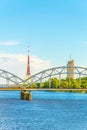 TV tower in Riga behind a steel railway bridge, Latvia...IMAGE Royalty Free Stock Photo