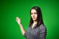 TV weather news reporter at work.News anchor presenting the world weather report.Television presenter recording in a green screen Royalty Free Stock Photo