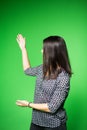 TV weather news reporter at work.News anchor presenting the world weather report.Television presenter recording in a green screen Royalty Free Stock Photo