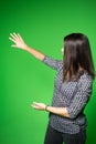 TV weather news reporter at work.News anchor presenting the world weather report.Television presenter recording in a green screen