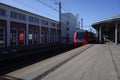 Tver, Russia - April 17, 2022. ES2G Lastochka train in Tver railway station, Russia. Sunny spring view.