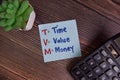 TVM - Time Value Money write on sticky notes isolated on Wooden Table Royalty Free Stock Photo