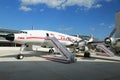 TWA Hotel`s 1958 Lockheed Constellation airplane in front of the landmark TWA Flight Center building designed by Eero Saarinen Royalty Free Stock Photo