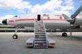 TWA Hotel`s 1958 Lockheed Constellation airplane in front of the landmark TWA Flight Center building designed by Eero Saarinen Royalty Free Stock Photo