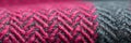 Tweed fabric weave macro texture, herringbone pattern, cranberry flecks banner. Panoramic web header. Wide screen wallpaper Royalty Free Stock Photo