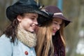 Tweed ride 2017. To bicycle ride unknown woman have arrived in ancient costumes and hats.