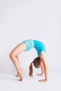 Tween girl in gymanstics bridge pose Royalty Free Stock Photo