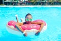 Tween girl in resort pool Royalty Free Stock Photo