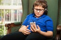 Tween listening to some music Royalty Free Stock Photo