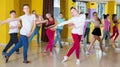 Tweens exercising in choreography class