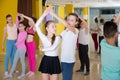 Tweens practicing jive in dance class Royalty Free Stock Photo