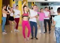 Tweens practicing vigorous dance in class Royalty Free Stock Photo