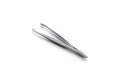 Tweezers of manicure set isolated on white background. Royalty Free Stock Photo