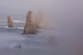 The Twelve Apostles along the Great Ocean Road, Victoria, Australia. Photographed at sunrise. Dawn fog Royalty Free Stock Photo