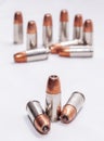 Twelve hollow point 9mm bullets isolated on a white background Royalty Free Stock Photo