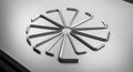 Twelve metal hex keys (Allen wrenches) are arranged in a radial pattern on a smooth, Royalty Free Stock Photo