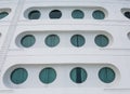 Twelve Portholes on Bow of Cruise Ship Royalty Free Stock Photo