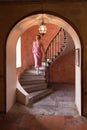 Twenties lady on stairs Royalty Free Stock Photo