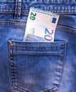 Twenty euros in the back pocket of your jeans. The concept of pocket money. Cash. Royalty Free Stock Photo