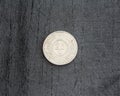 25 (twenty five) cent Netherlands Antillean guilder coin on black background Royalty Free Stock Photo