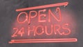 Twenty-four seven working shop, neon sign Open 24 hours in cafe bar local pub Royalty Free Stock Photo