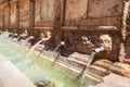 Twenty pipes fountain in Daroca village province of Zaragoza, Spain. Royalty Free Stock Photo