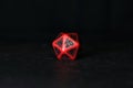 A polyhedral twenty sided die used for role playing games such a