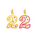 Twenty two years anniversary, 22 number shaped birthday candle with fire isolated on white Royalty Free Stock Photo