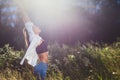 Twenty-year-old girl in jeans and white shirt in the box Royalty Free Stock Photo