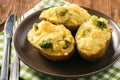 Twice baked potatoes stuffed with broccoli, sour cream and cheese. Royalty Free Stock Photo