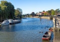 TWICKENHAM, RICHMOND, LONDON, UK - SEPTEMBER 20, 2019: View along the Thames river to the bridge which leads to Eel PIe