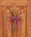 Twig cross on church door