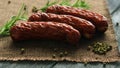 Spices near whole sausages