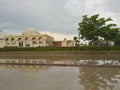 Mosque beside the newly irrigated rice fields Royalty Free Stock Photo
