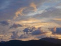 Twilight beautiful evening cloudy sky and silhouette mountain Royalty Free Stock Photo