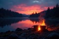 Twilight campfire glow, steaming mugs by lake , campfire, firelight Royalty Free Stock Photo