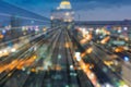 Twilight city blur light downtown double expose train track motion Royalty Free Stock Photo