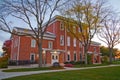 Twilight Glow Over Traditional Red Brick Building in Indiana Autumn