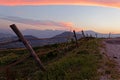 Twilight in the mountain fields and a pink sky Royalty Free Stock Photo