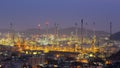 Twilight, refinery petrochemical lightsAerial view refinery petrochemical lights with mountain background Royalty Free Stock Photo