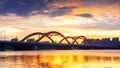 Twilight scene of Shengli Road Bridge, illuminated by the warm glow of the setting