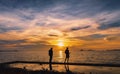 seascape the sunset and light gold with fisherman silhouette foreground on island in Thailand