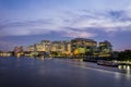 Twilight at Siriraj hospital with a light trail of boat in Chao Praya river Royalty Free Stock Photo