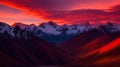 The twilight sky above the mountain is a breathtaking canvas of fiery oranges and deep red