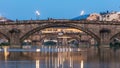 Twilight sky scene of Ponte Alla Carraia and Santa Trinita Holy Trinity Bridge day to night timelapse over River Arno Royalty Free Stock Photo