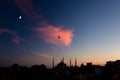 Twilight urban View of historical District of Istanbul City with Sea Gulls Royalty Free Stock Photo