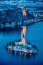 Twilight view of Lake Bled with Bled Island and Bled Castle in winter, Slovenia Royalty Free Stock Photo
