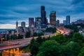 Twilight view of the Seattle skyline from the Jose Rizal Bridge, in Seattle, Washington. Royalty Free Stock Photo