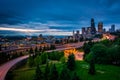 Twilight view of the Seattle skyline from the Jose Rizal Bridge, in Seattle, Washington. Royalty Free Stock Photo