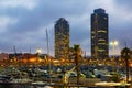 Twilight view of skyscrapers from port. Barcelona Royalty Free Stock Photo